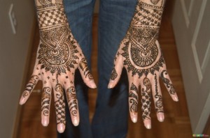 Complicated Mehndi Design on Hand Top